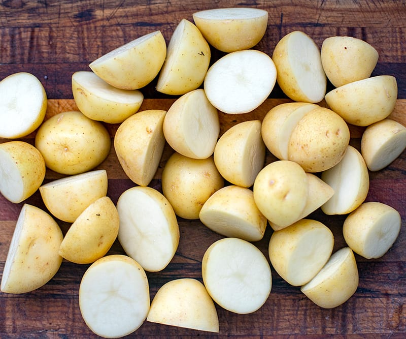 Cut potatoes for cooking for salad