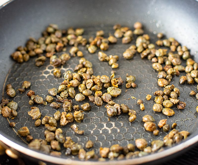 Pan fry the capers for salad
