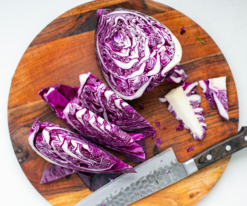 Cutting red cabbage for coleslaw