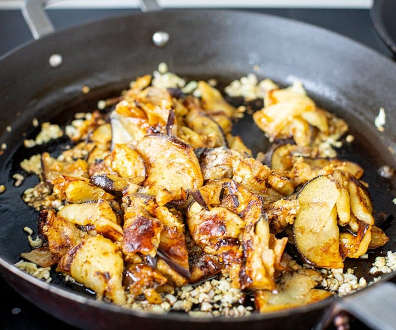 Cook eggplant with aromatics and soy sauce