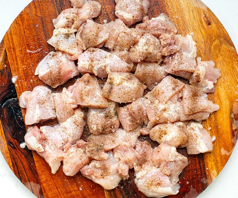 Chicken thighs seasoned with pepper and salt