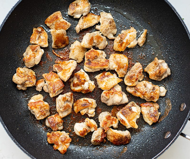 Pan-fried chicken in a skillet