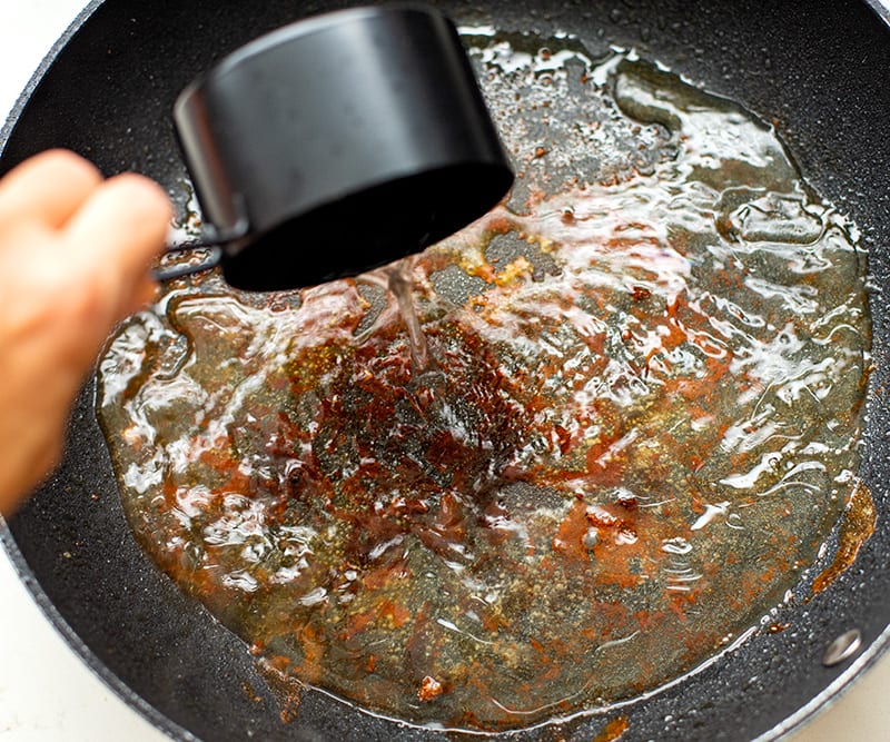 Deglaze the pan with water