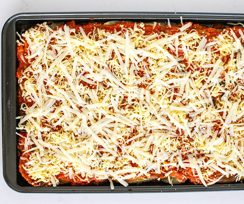 Add more tomato sauce and cheese