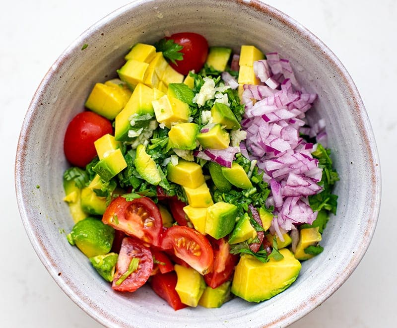 Avocado and tomatoes with onion