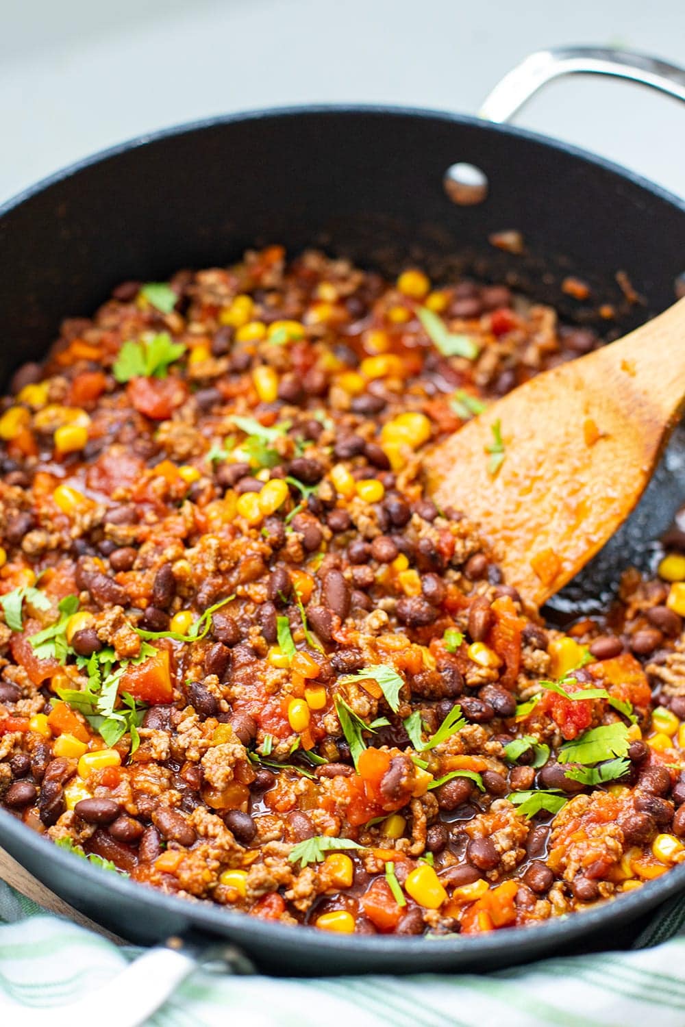 the-recipe-for-mexican-beef-and-rice-casserole-is-shown-in-an-old