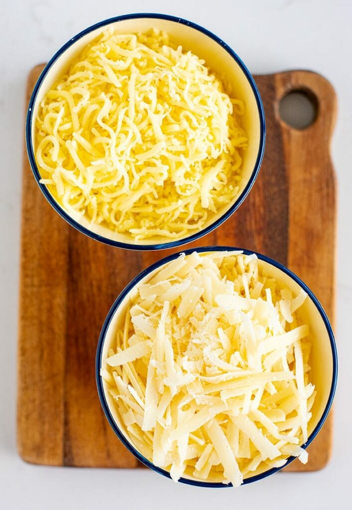 Grated mozzarella and Parmesan