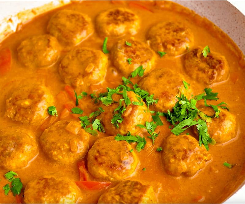 Curry meatballs with cilantro on top
