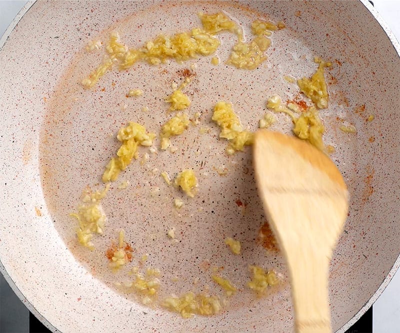 Garlic and ginger frying in a pan