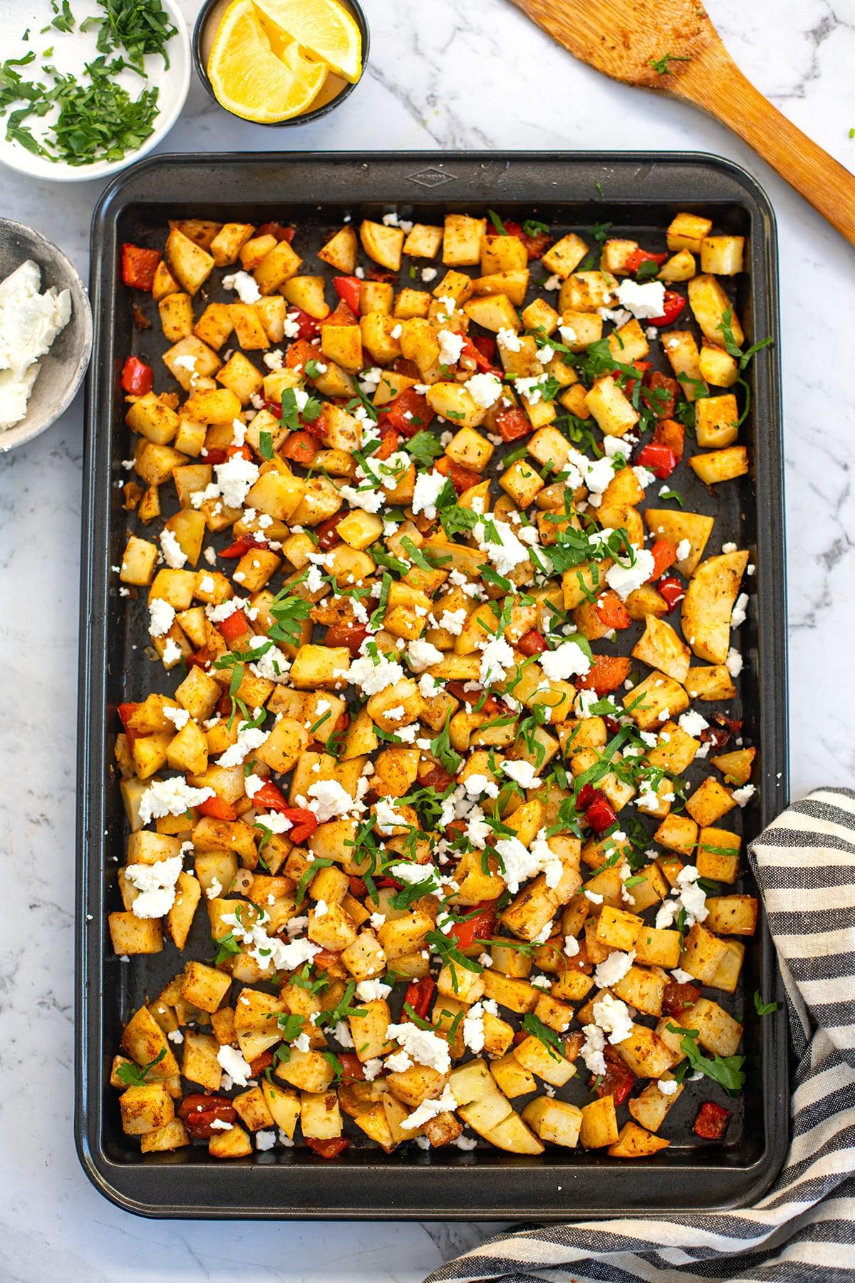 Greek potatoes roasted with red peppers and feta