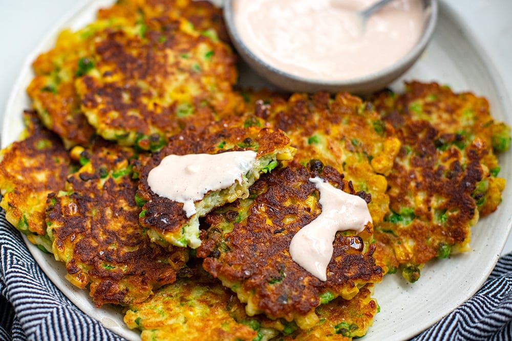 Fritters made with halloumi, peas and corn