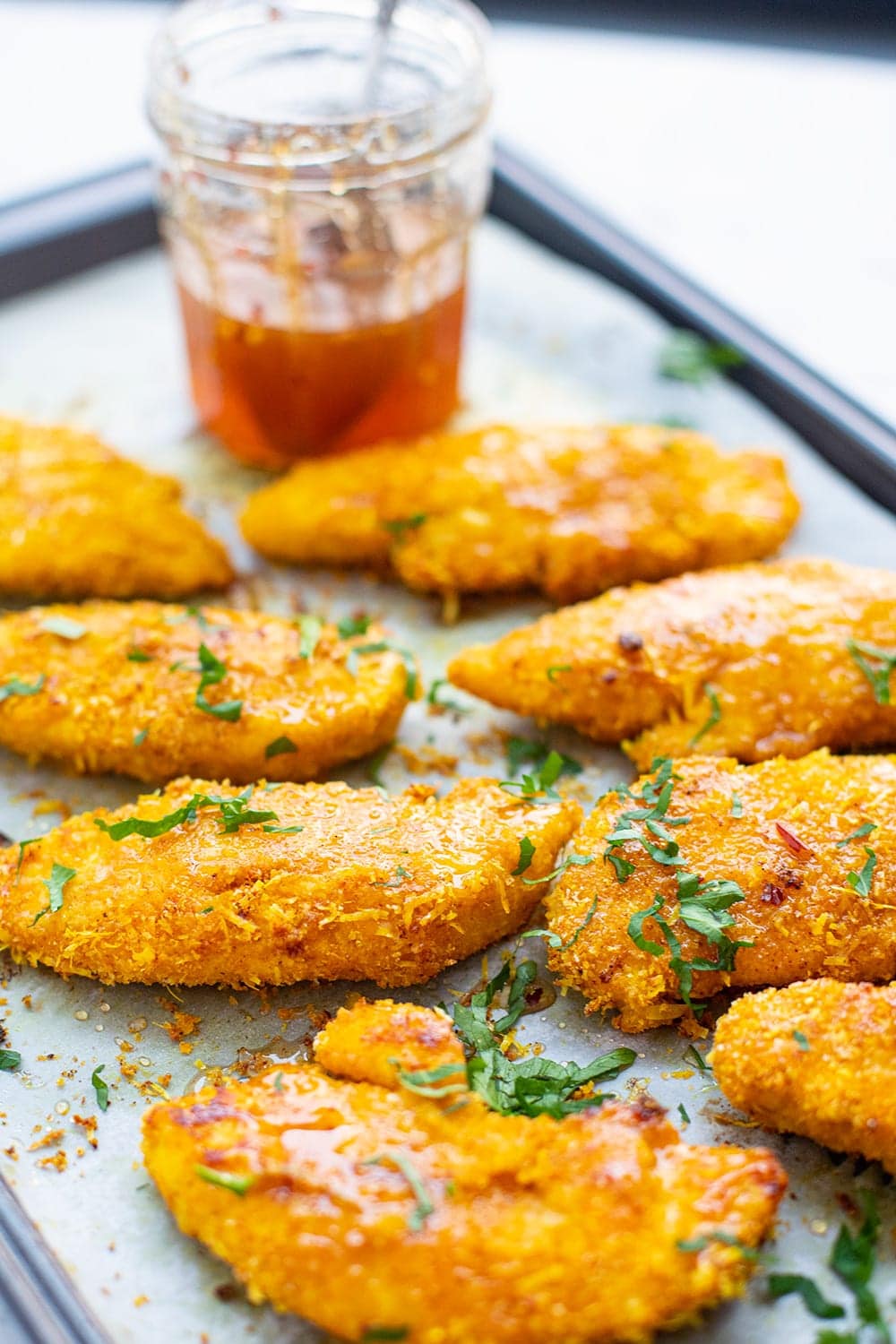 Hot honey chicken tenders with Parmesan crumbs