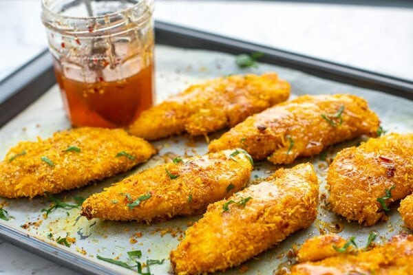 Hot honey chicken tenders with Parmesan crumbs