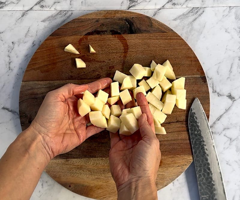 Cut potatoes into cubes