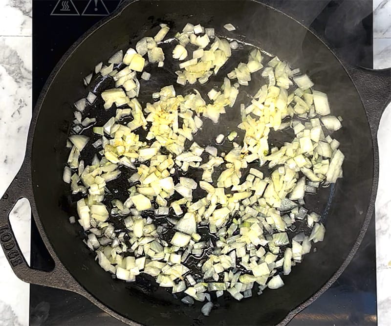 Saute onions in a skillet