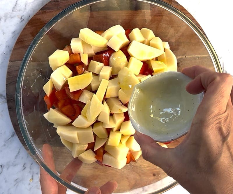 Combine potatoes with oil and salt