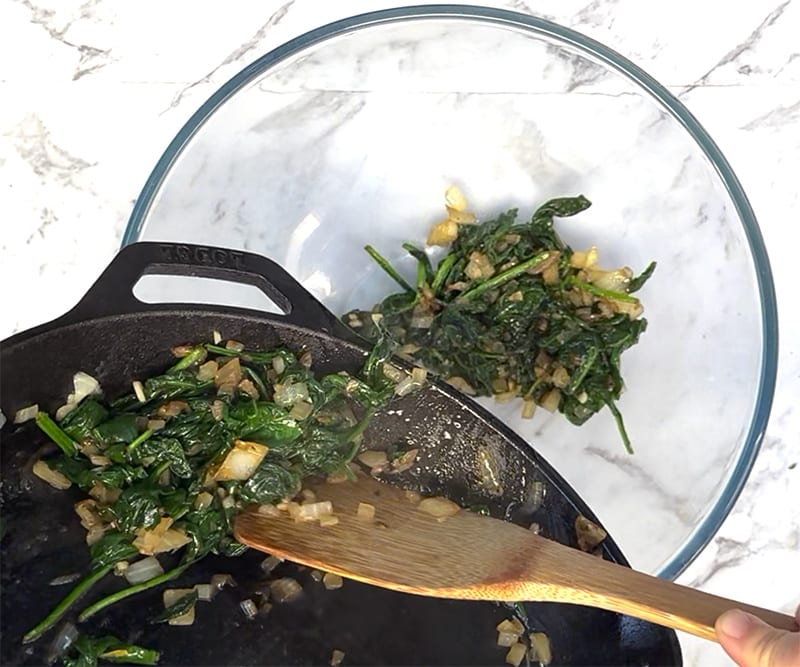 Transfer spinach to a bowl