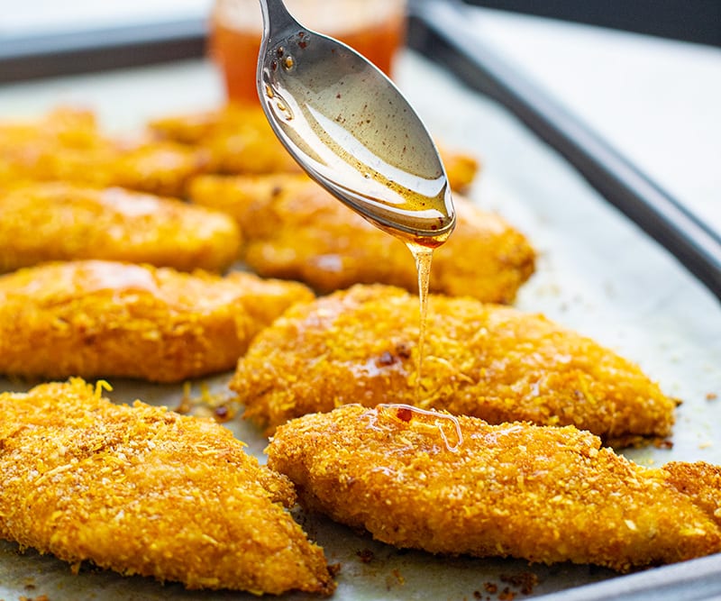 Honey drizzled over chicken tenders