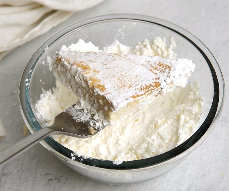 Coating tofu with flour