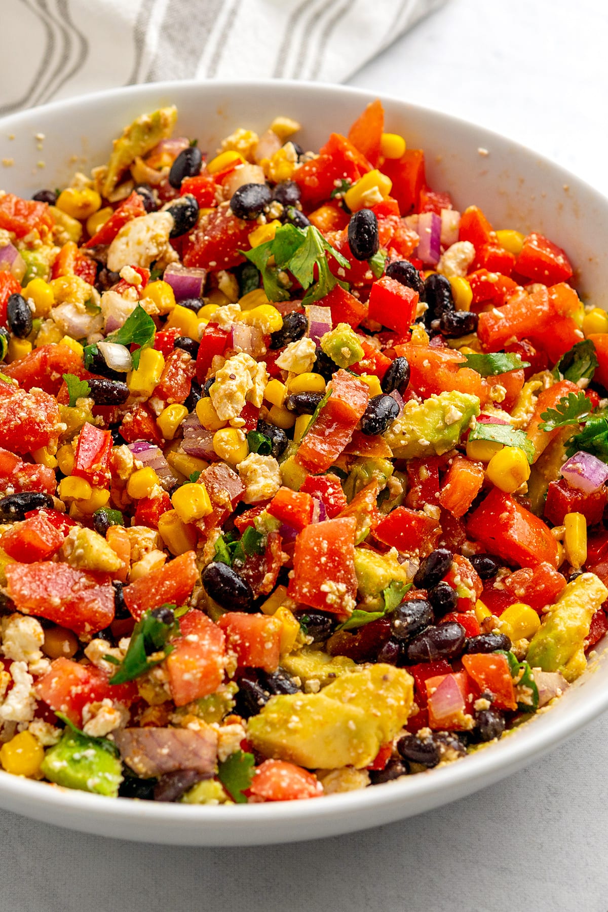 Fiesta salad with black beans, corn, avocado, peppers