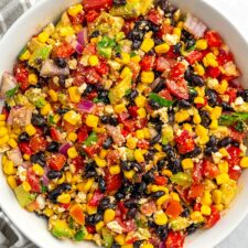 Mexican Salad (Fiesta Salad) with black beans, corn, avocado, and tomatoes