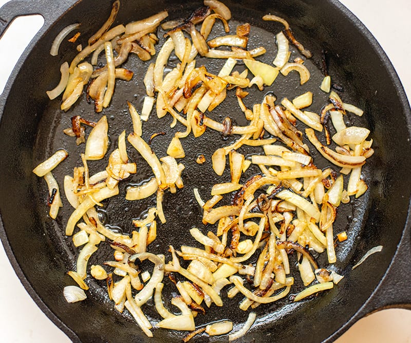 Sauteed onions in a pan