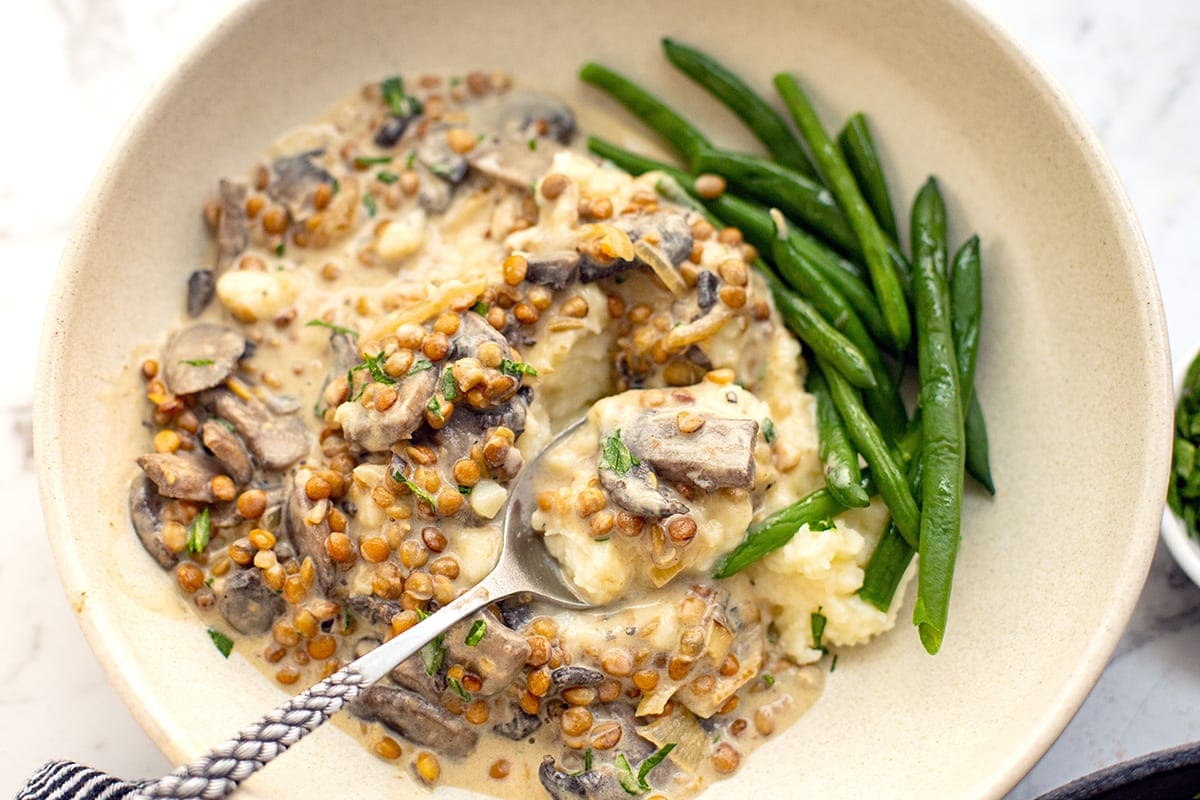 Vegetarian stroganoff with mushrooms and lentils