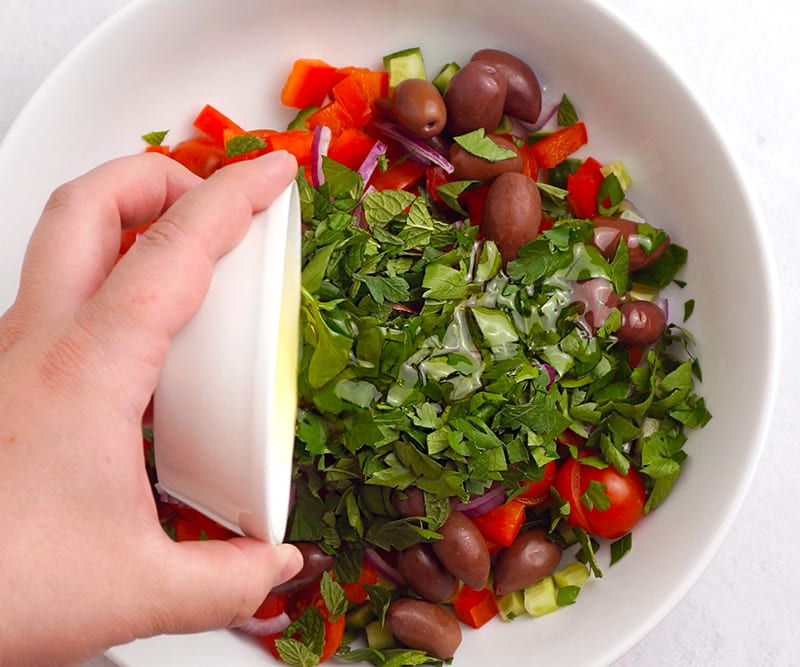 Make Greek style salad with herbs