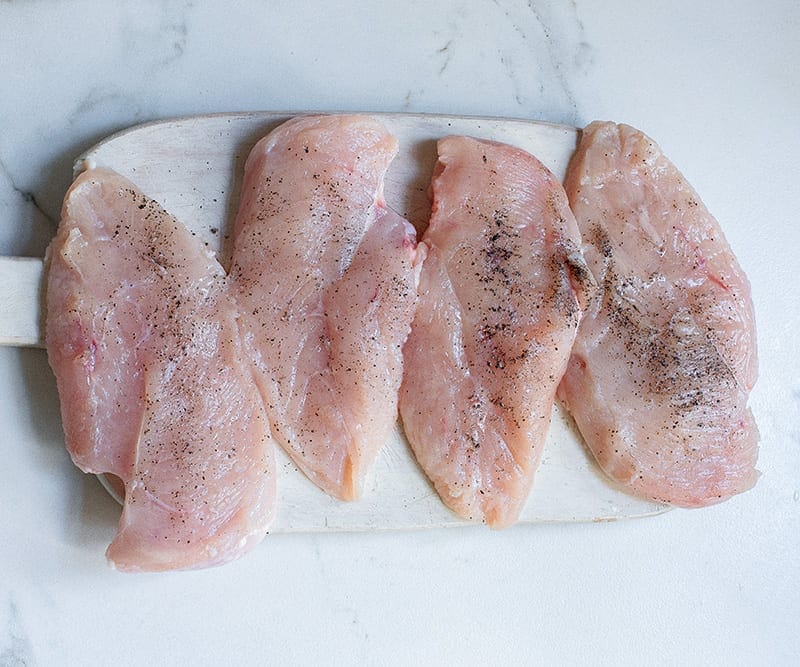 Season chicken slices