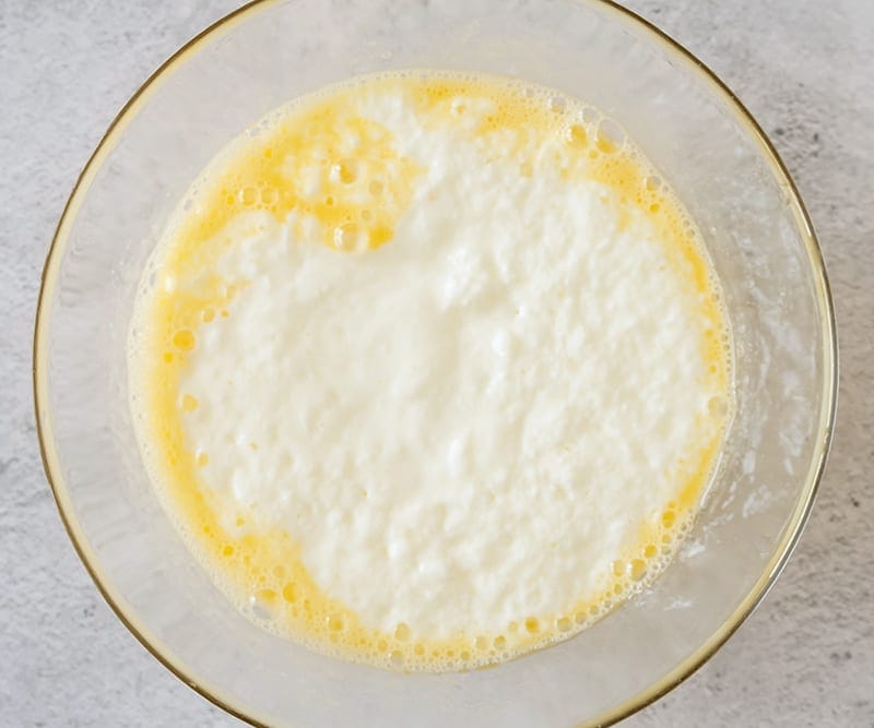 Mix yogurt and egg mixture