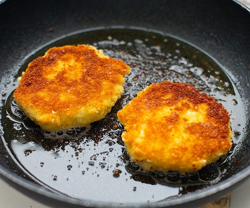 Frying fish patties for the best fish sandwiches.