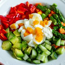 Detox rainbow salad with eggs, Avocado, Asparagus, Red Peppers and cucumbers