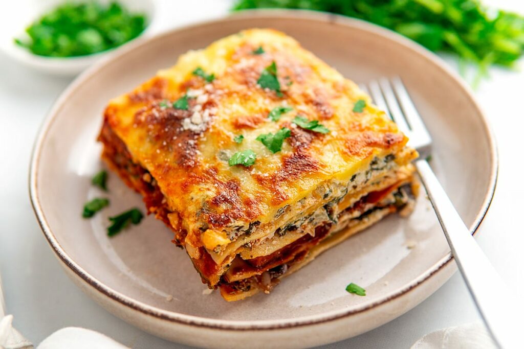 vegetable lasagna with cottage cheese slice on a plate