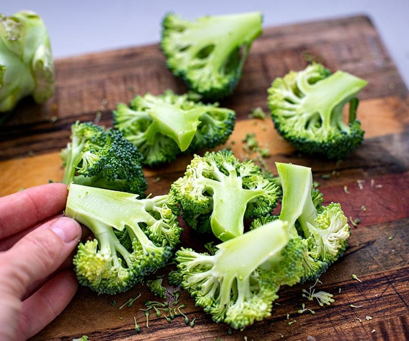 broccoli florets on a cutting board