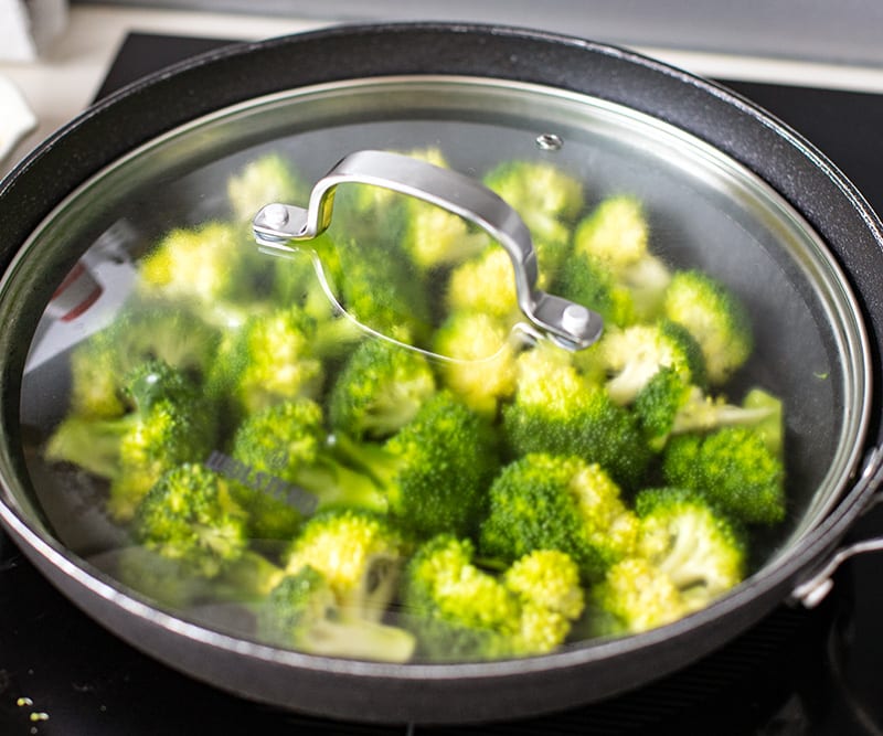 Cover broccoli with lid