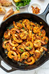 crispy garlic prawns in a skillet.