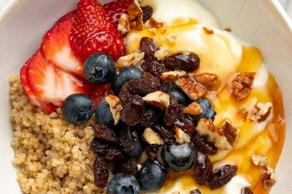 Quinoa Breakfast Bowl With Yogurt, Nuts & Berries
