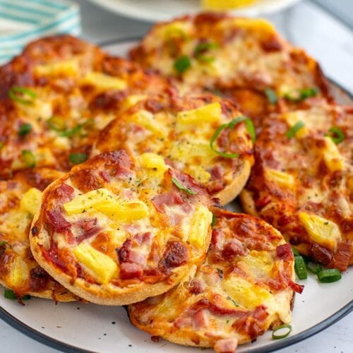 mini pizza with ham and pineapple on English muffins and naan bread