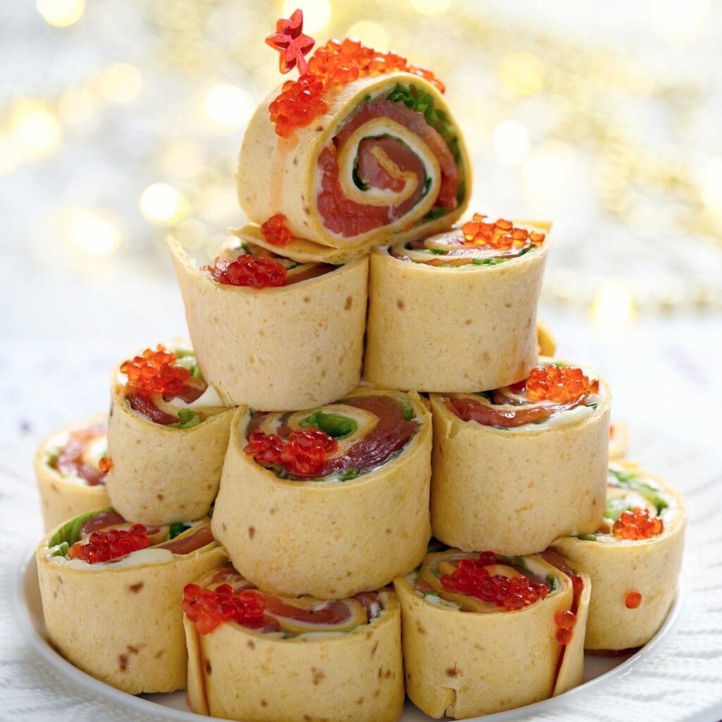 Pinwheel sandwiches with cream cheese and salmon, plus salmon fish roe - these look very festive when built as a tower pyramid.