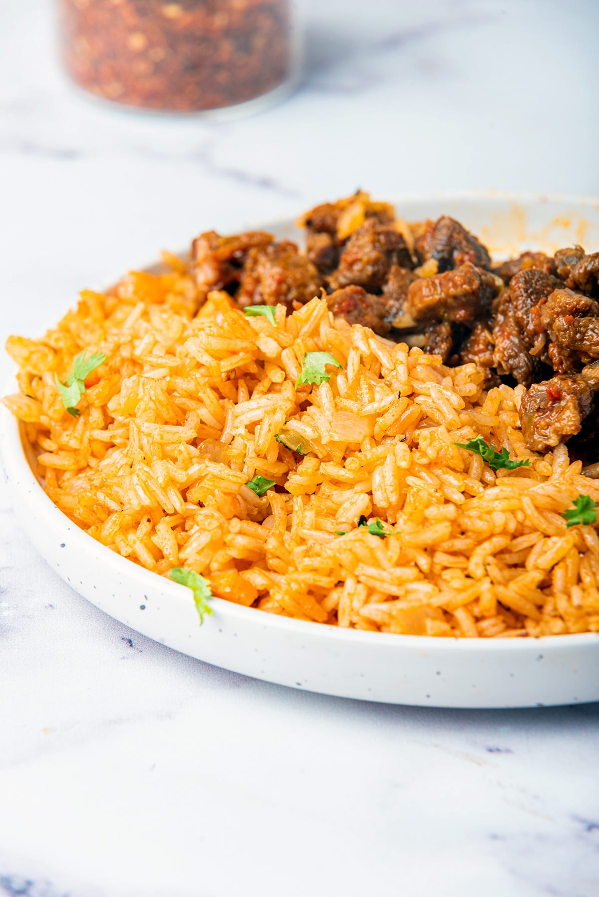 Arroz rojo on a plate with beef