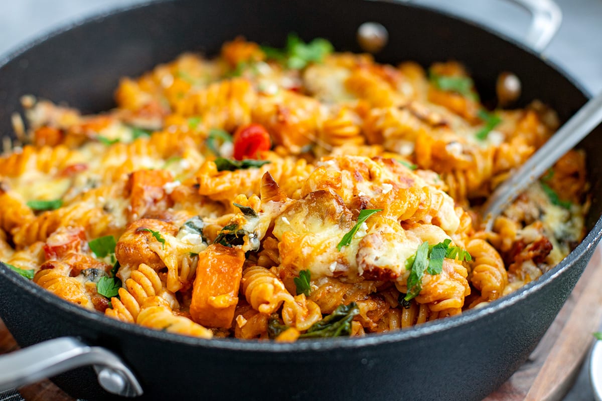 vegetable pasta bake with grilled cheese on top