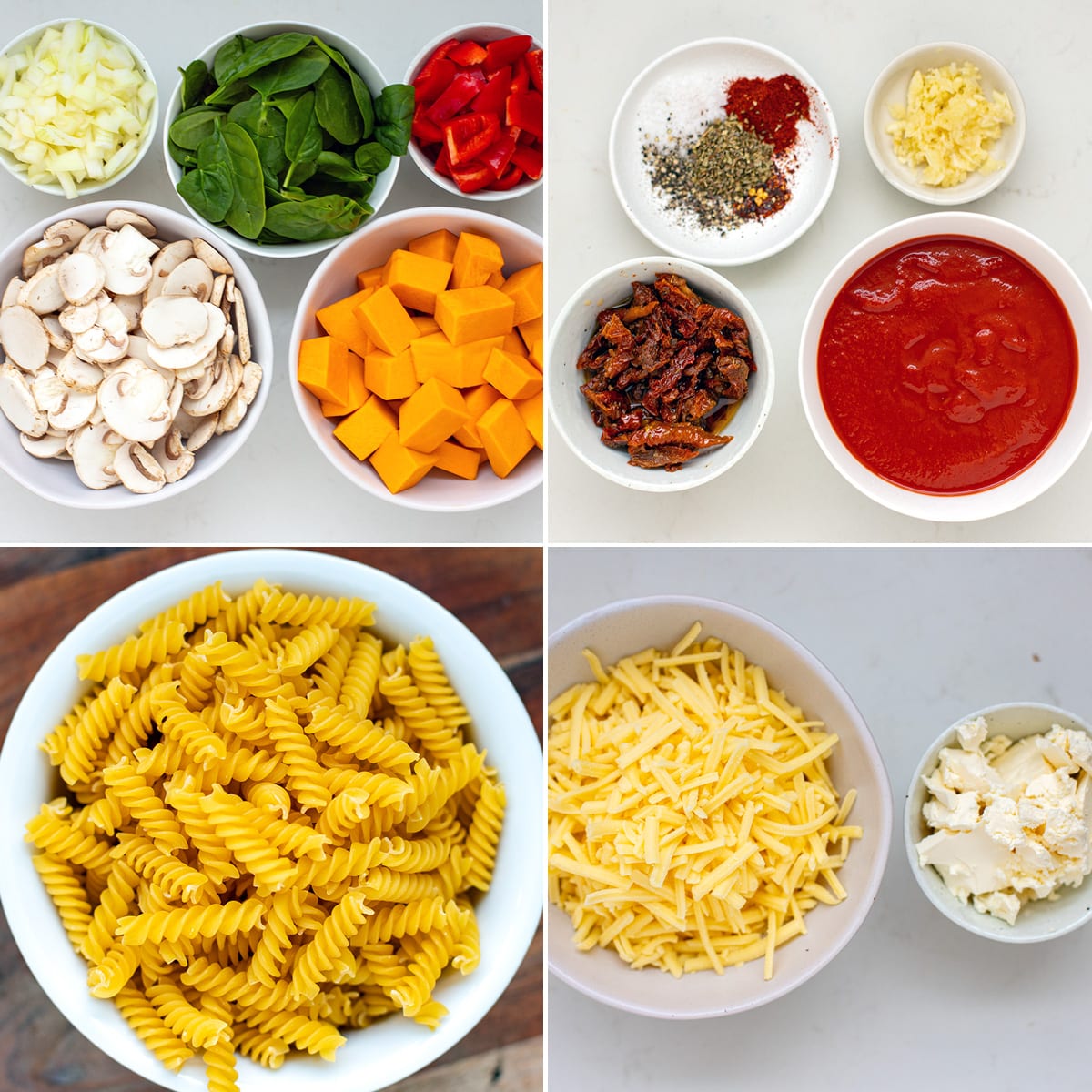 Ingredients for vegetable pasta bake: mushrooms, butternut squash, baby spinach, onions, and red peppers; tomato sauce, sun-dried tomatoes, garlic, pepper, chili, salt; fusilli pasta, feta and grated cheese.