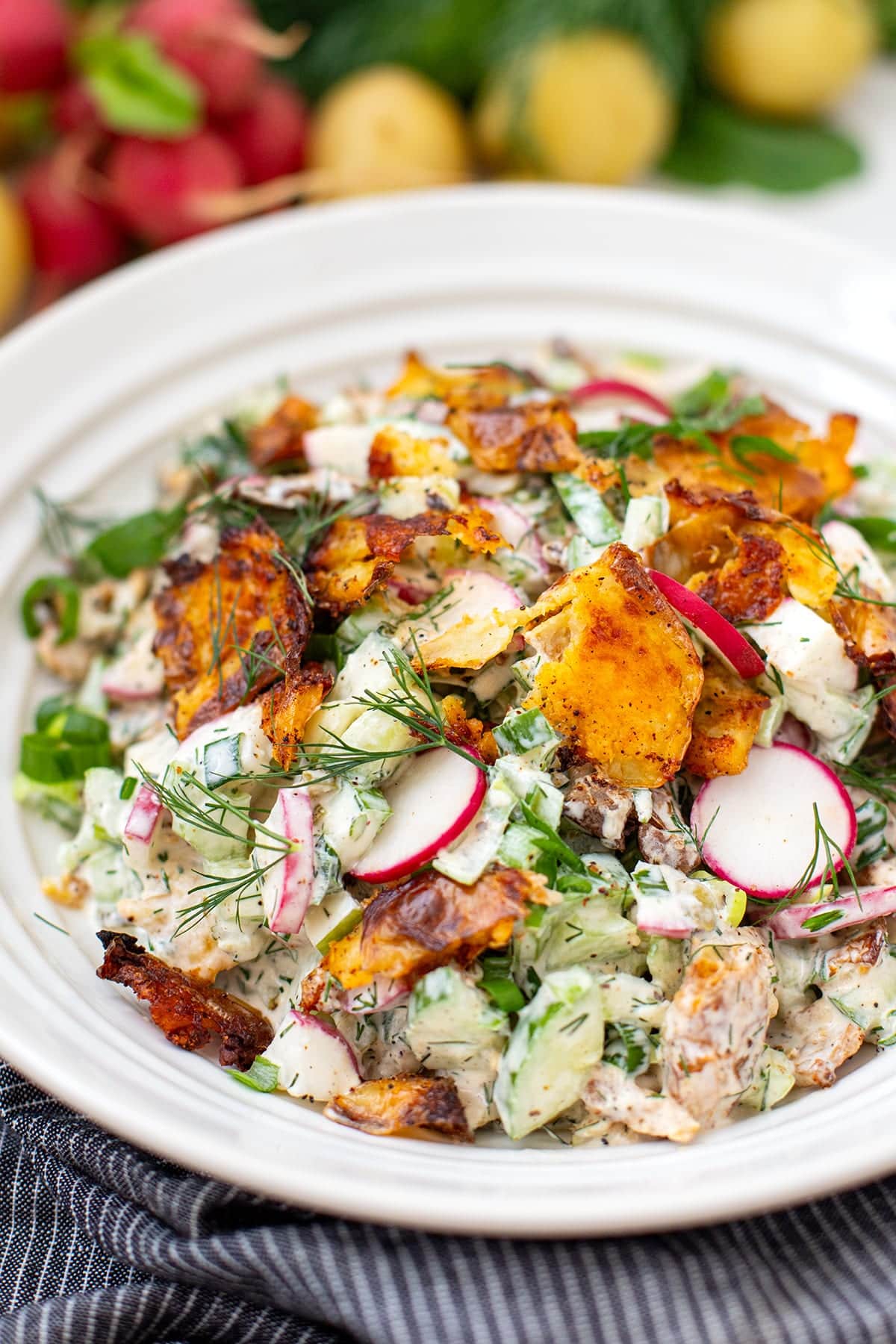 Crispy smashed potato salad in a bowl