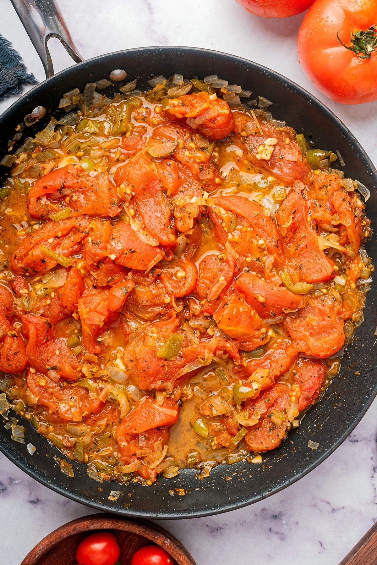 Stewed tomatoes recipe in a skillet