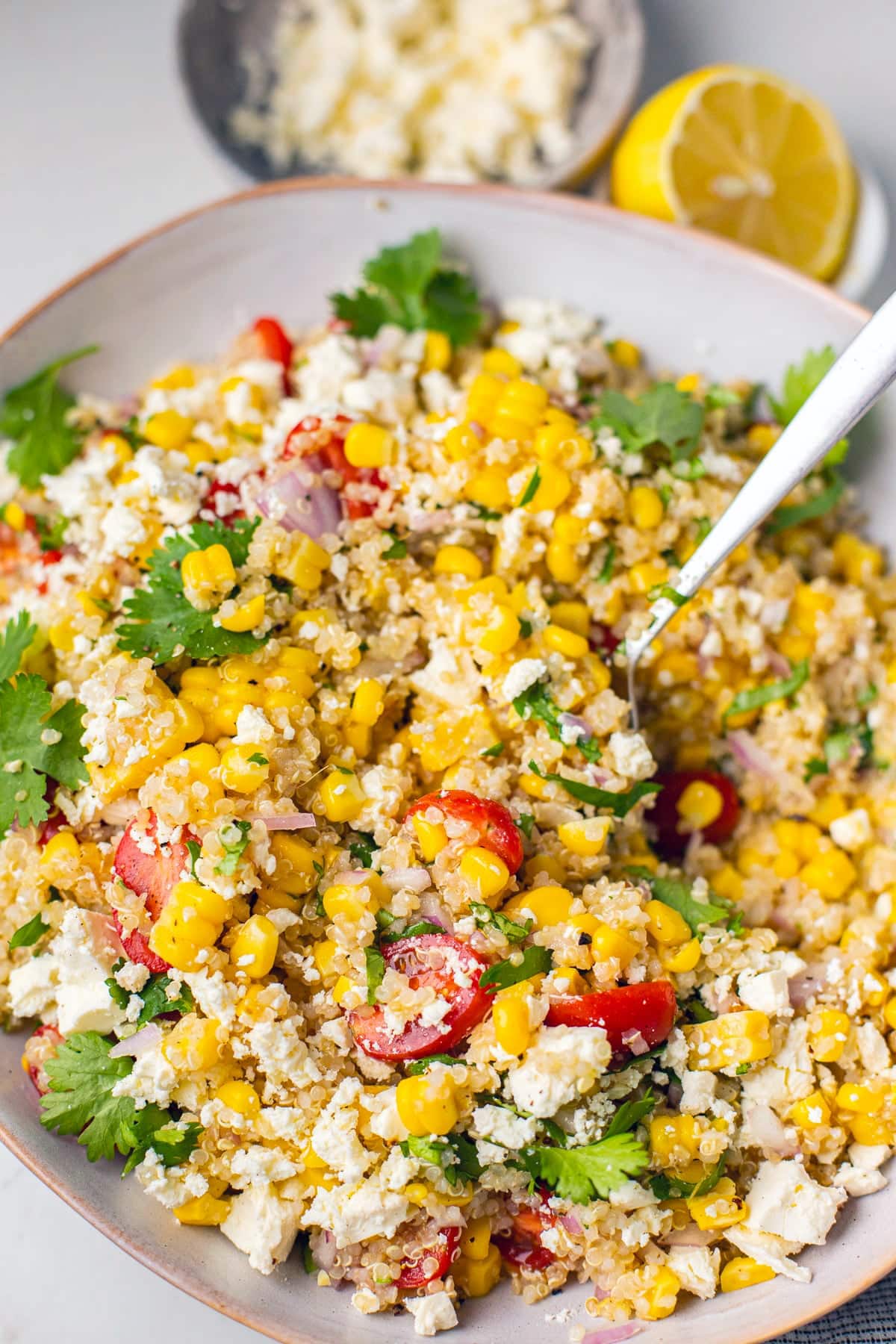 Corn Quinoa Salad With Cherry Tomatoes & Feta.