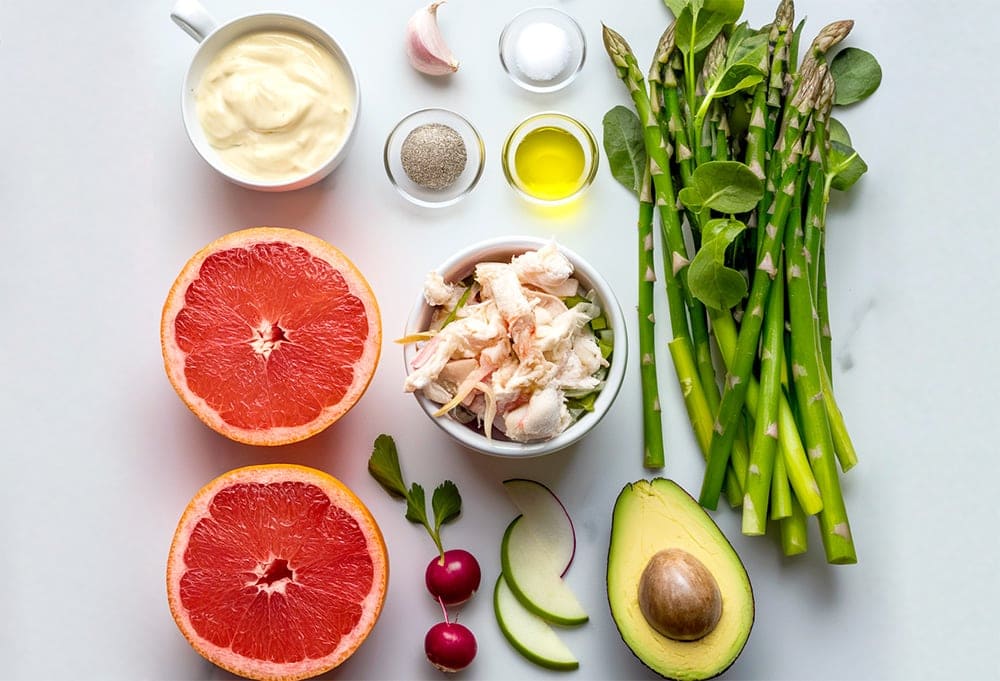 healthy salad with crab, avocado, asparagus, and pink grapefruit dressing ingredients