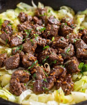 Garlic Butter Steak Bites With Sautéed Cabbage feature