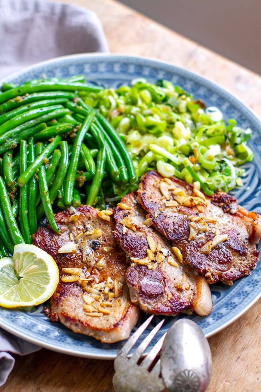 Garlic Pork Chop Steak With Lemon Pepper Beans & Leeks
