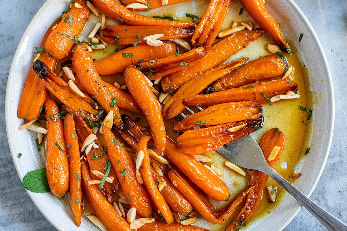 Maple glazed carrots with almonds and mint.