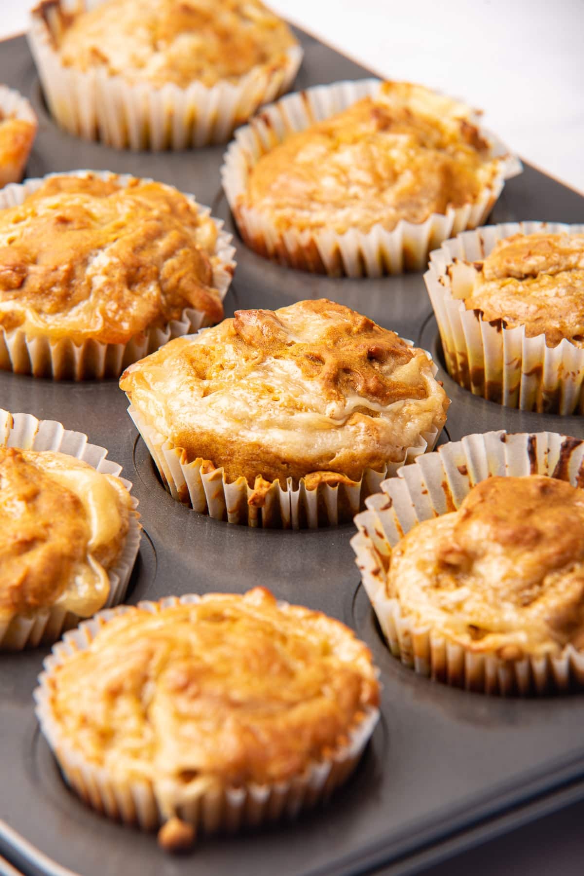gluten-free muffins made with pumpkin puree and cream cheese filling
